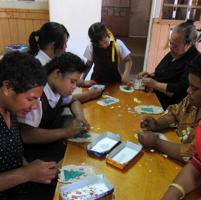 Children learning at the Ofa Tue Amanaki Centre.