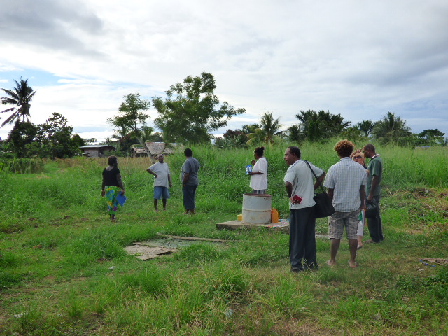 Board members looking at the site for the new classrooms with builder Patteson Amos. The site is soon to be cleared by parent volunteers in preparation for the construction to begin.